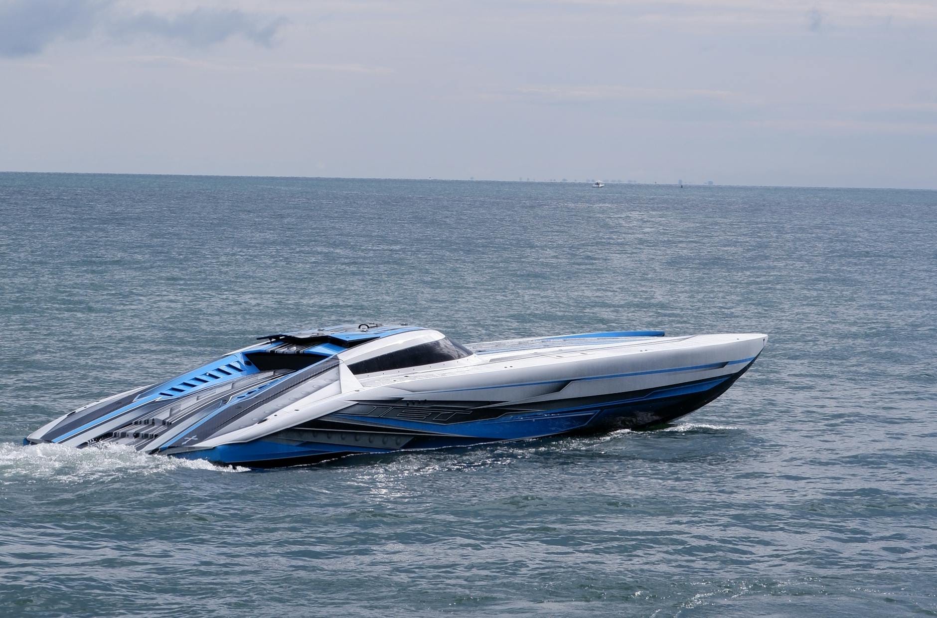 A modern speedboat cruising on the open sea — the AirFish 8 WIG craft promises to revolutionise the Singapore-Batam crossing